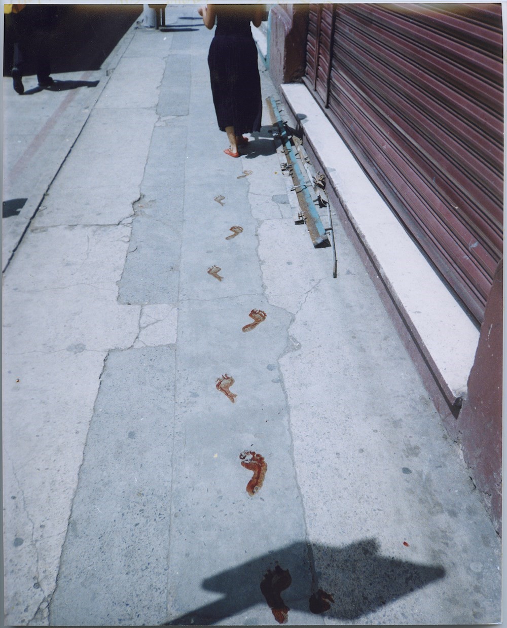 Regina José Galindo, “Who Can Erase the Traces_ (Quién puede borrar las huellas_)”, (2003)