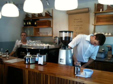 Tim Windelboe and a barista behind the counter Tim Windelboe and a barista behind the counter