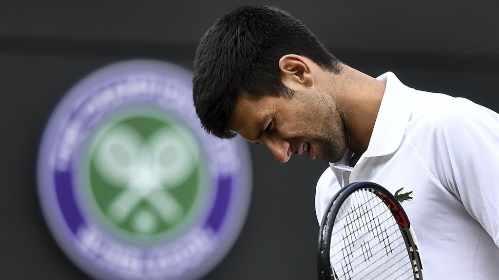 Djokovic out for season with elbow injury