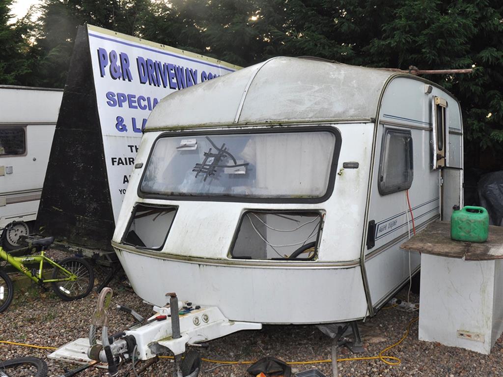 Dangerous: The caravan was rigged up to a nearby electricity pylon