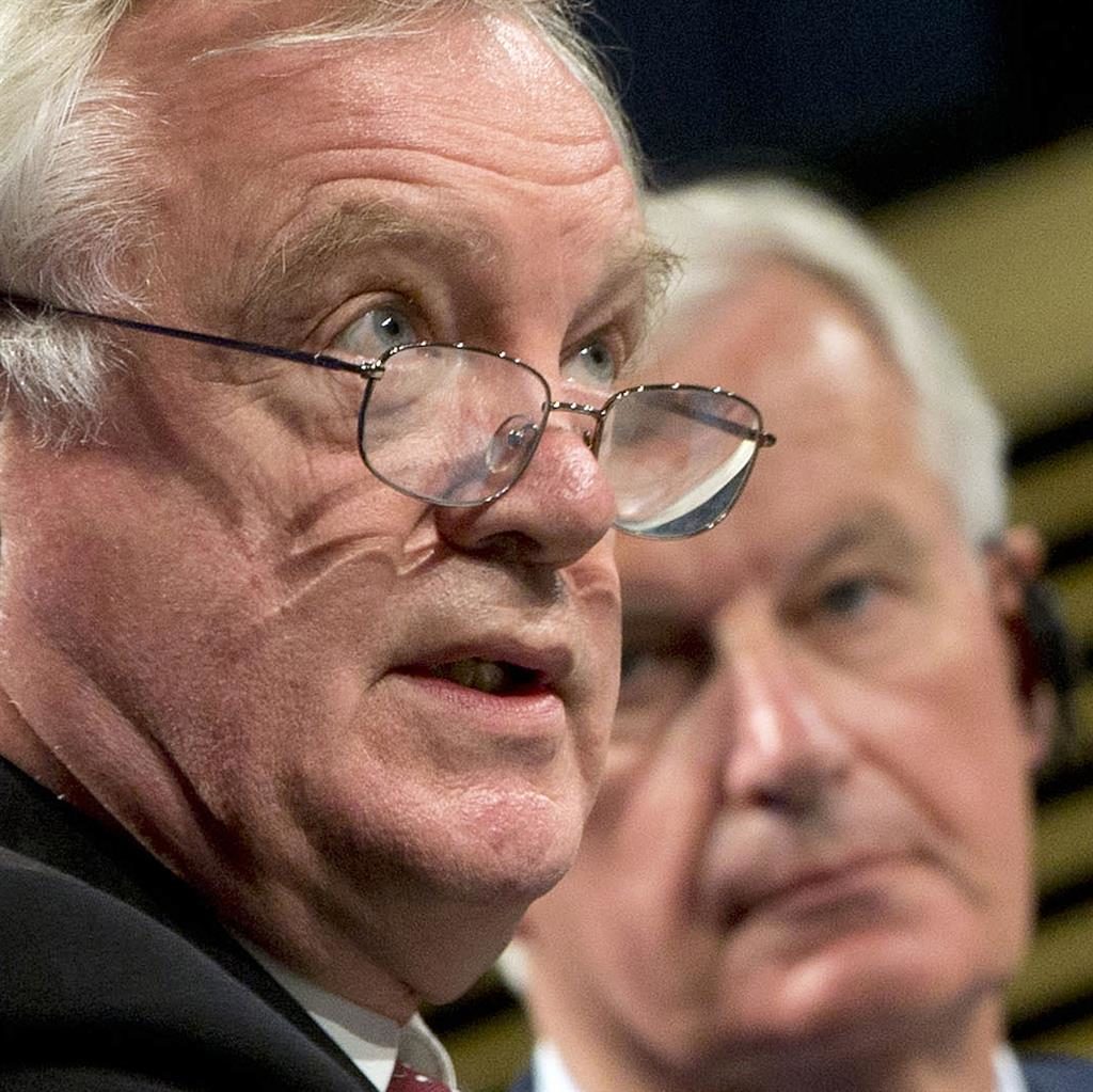 Tetchy exchange Mr Davis and Mr Barnier