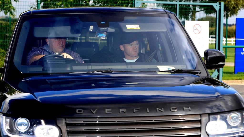 Everton striker Wayne Rooney gets lift to training Everton striker Wayne Rooney gets lift to training