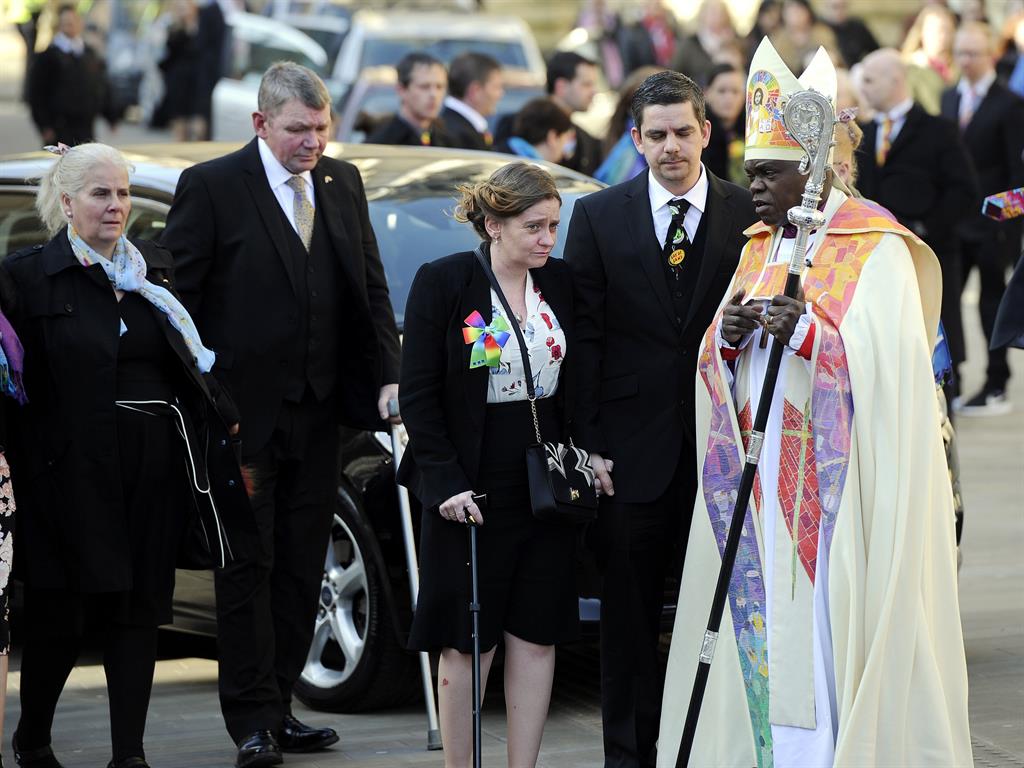 Grief: Paul and Alison Rough (centre), parents of murdered York schoolgirl Katie Rough, arriving at York Minster with the Archbishop of York Dr John Sentamu back in February for a service PICTURE: PA