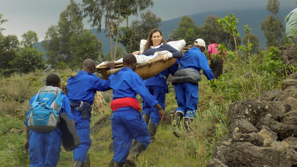 Mountain to climb: Susie is stretchered up by the porters
