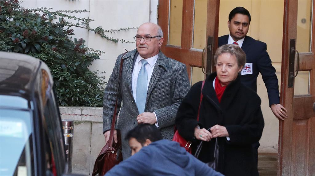 Tough talking: Oxfam’s chief executive Mark Goldring and chair Caroline Thomson leave a meeting at the Department for International Development. PICTURE: EPA