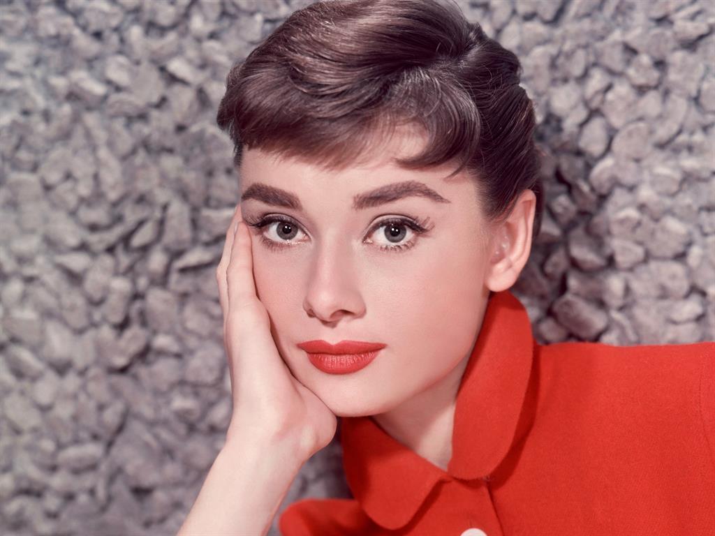 In the thick of it: Audrey Hepburn and Elizabeth Taylor (below)