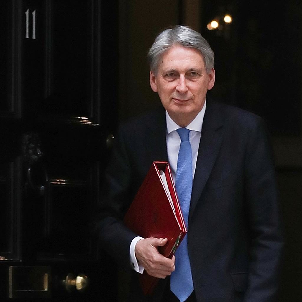 United Kingdom economy to grow slightly more quickly, Hammond predicts
