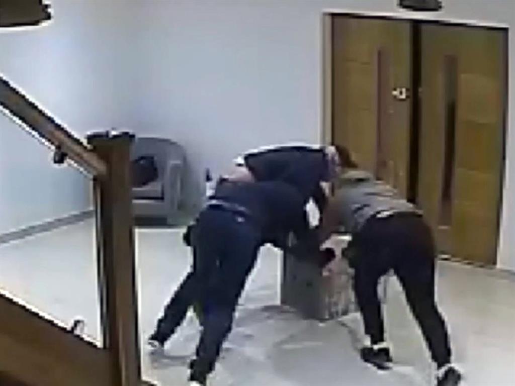 Caught on camera: Police released footage of what is thought to be the same gang stealing a safe in a raid on a property in Keston, five miles from the Chislehurst burglary PICTURES: PA/MET POLICE