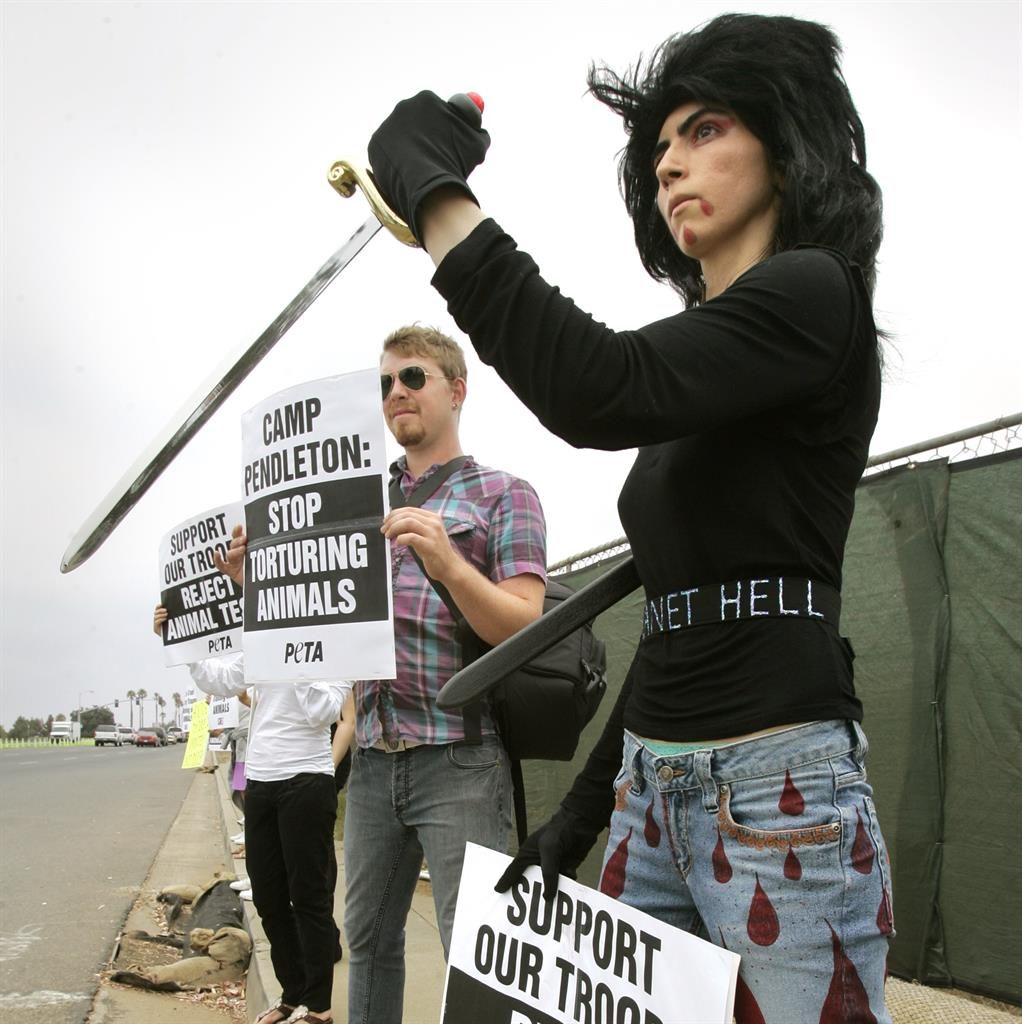 Animal rights Aghdam during a 2009 protest at a Marine base