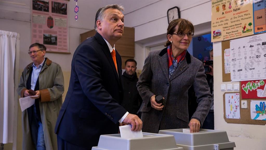 Migration push Mr Orbán and his wife Anikó Lévai at the polls PIC GETTY