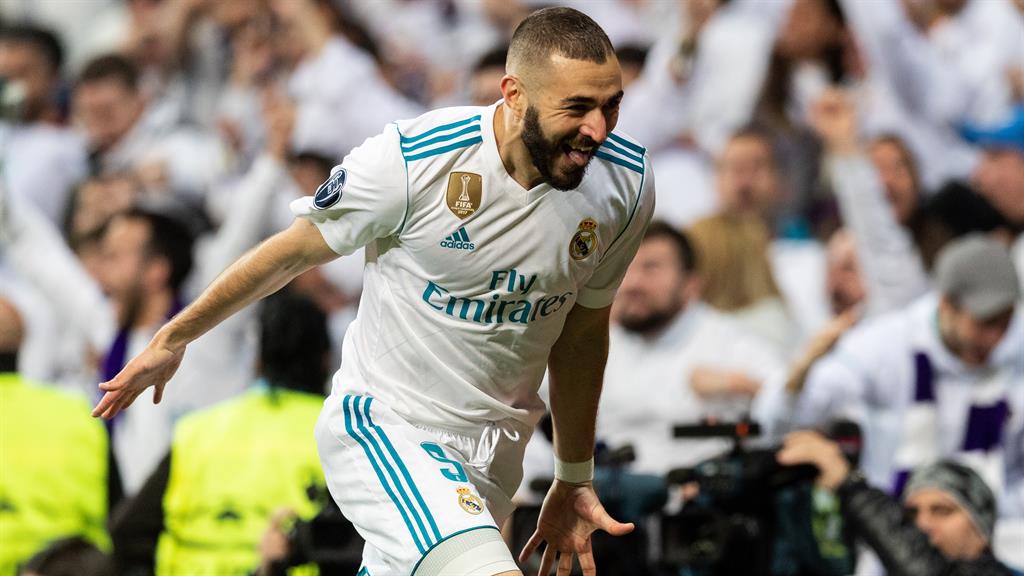 Karim Benzema sends Real Madrid into third straight ...