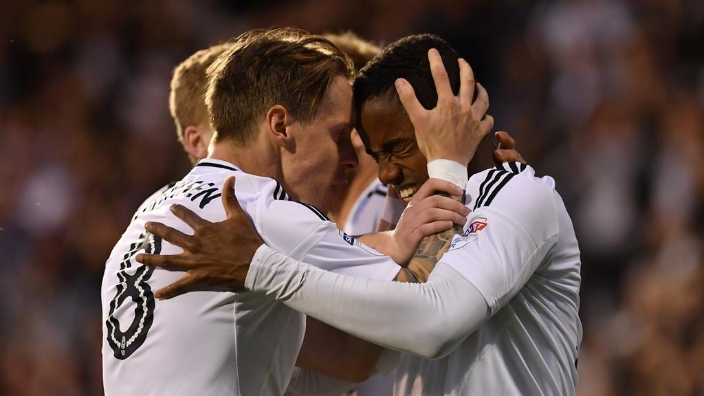 Boy wonder Sessegnon celebrates his equaliser with Stefan Johansen