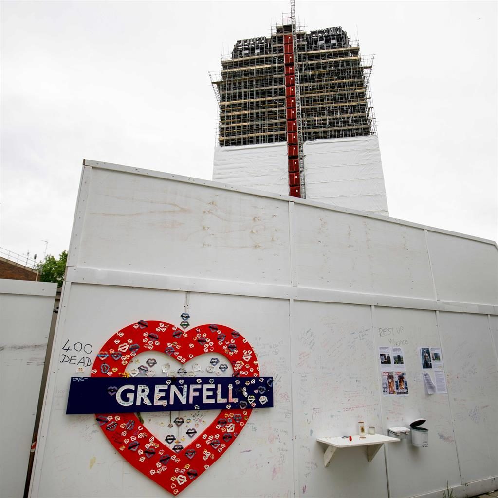 Theresa May announces plan to remove cladding at cost of £400m