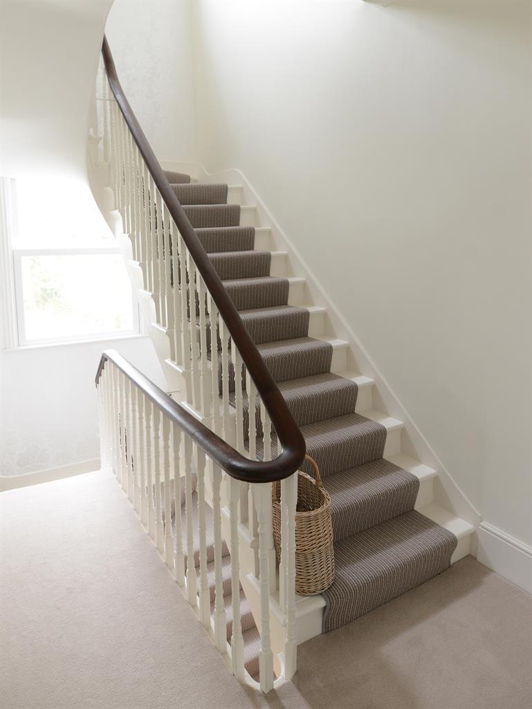 Stairway to heaven: Georgina stopped the Victorian bannisters being ripped out