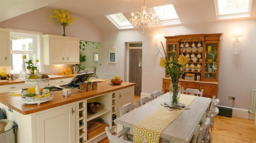 Total transformation: The kitchen was full of mould with broken windows when Georgina bought the house
