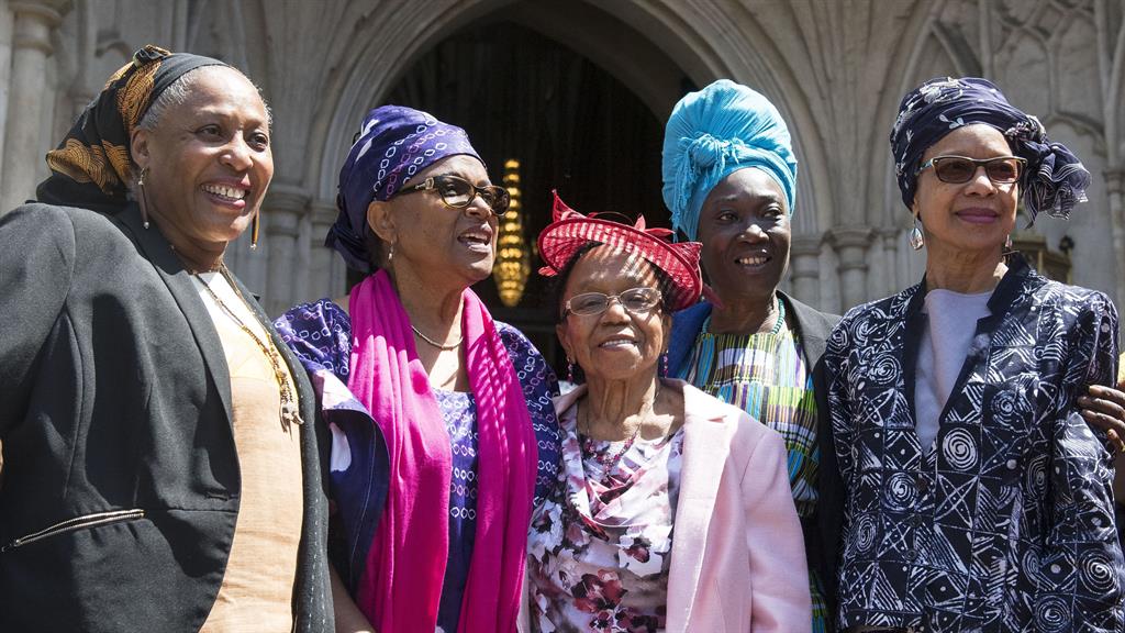 Guests: Windrush members and their families leave after the service of thanksgiving