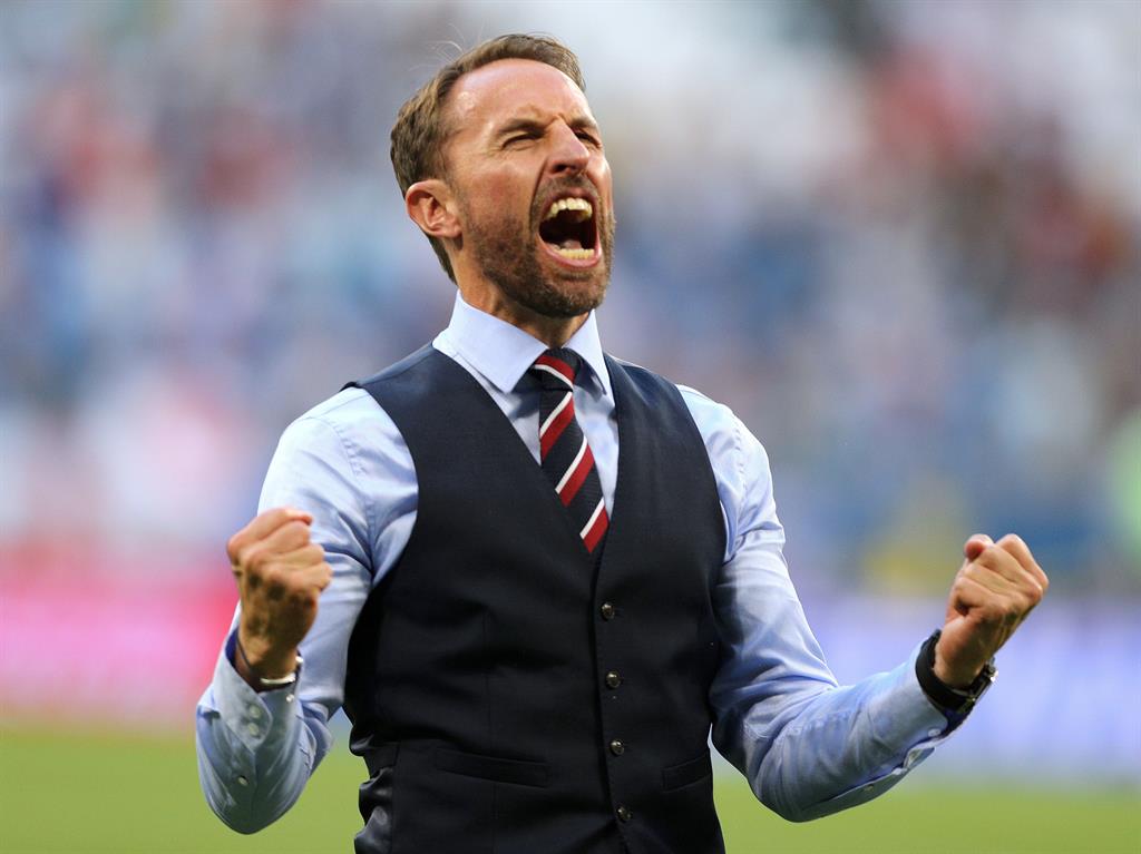 Trendsetter: Southgate in one of his trademark waistcoats PICTURE: PA