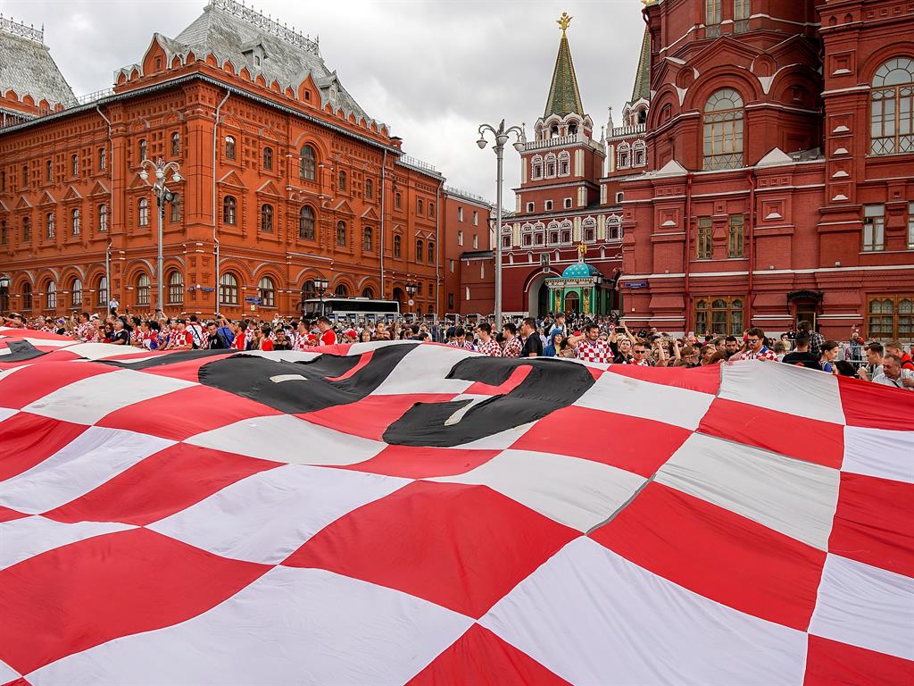 Checkmate: Croatian football fans unfurl a giant flag near Red Square