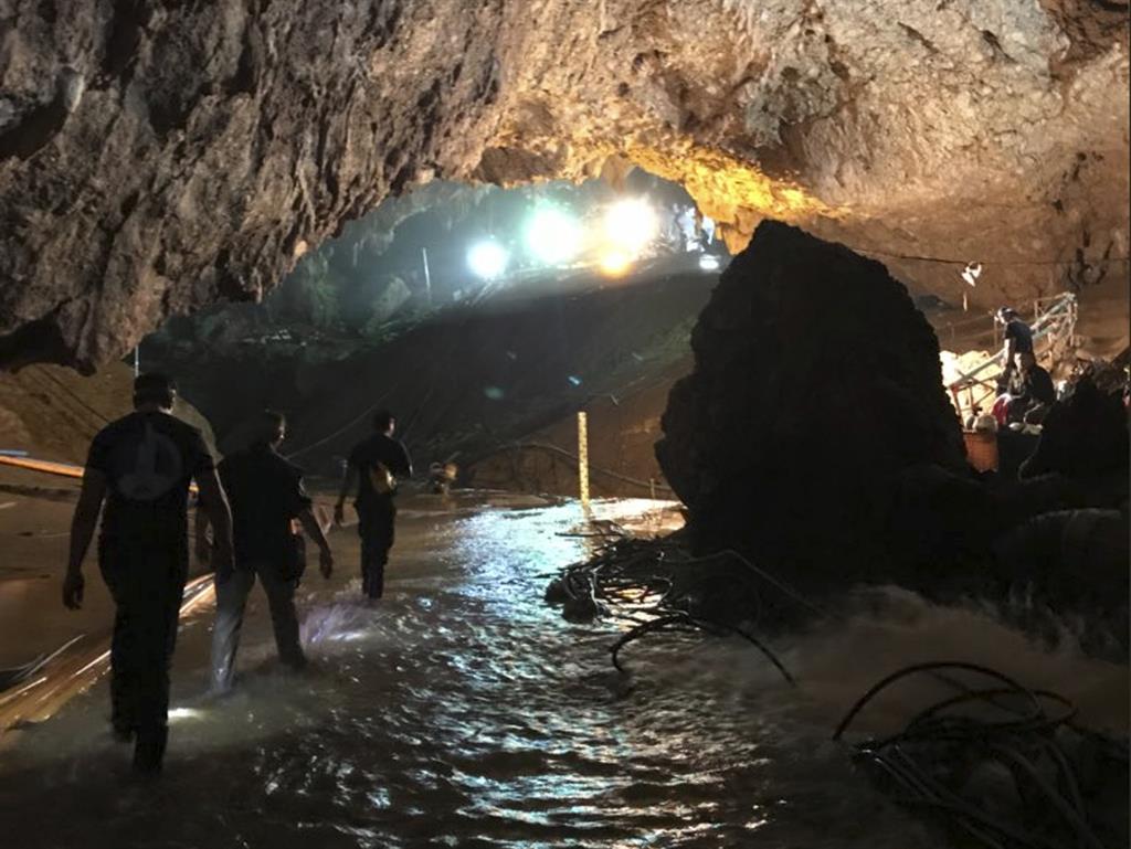 Going in: This photo, tweeted by Elon Musk, shows efforts under way to rescue the trapped boys PICTURE: TWITTER/AP