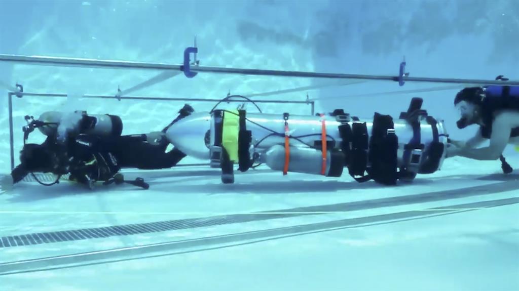 Billionaire's plan: Frame grab from video tweeted by Elon Musk shows a 'tiny kid-sized submarine' being tested in a pool PICTURE: TWITTER/AP