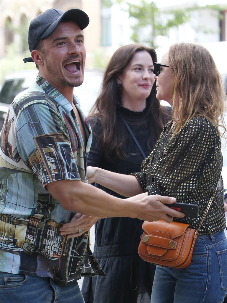 Something in the way they move: Orlando Bloom with Stella McCartney and Liv Tyler PICS: REX/GC IMAGES