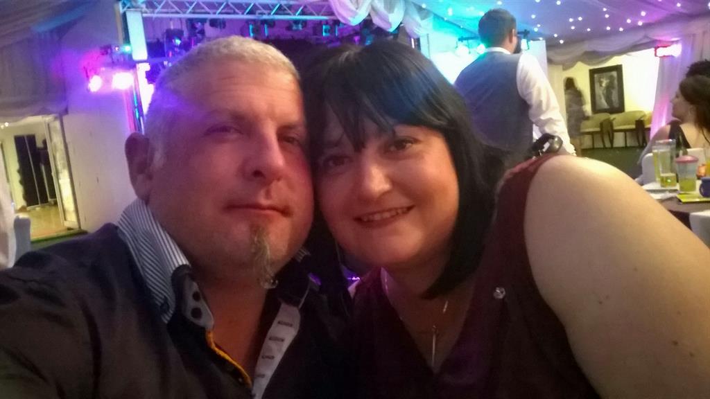 In love: Groom Damian with bride Louise