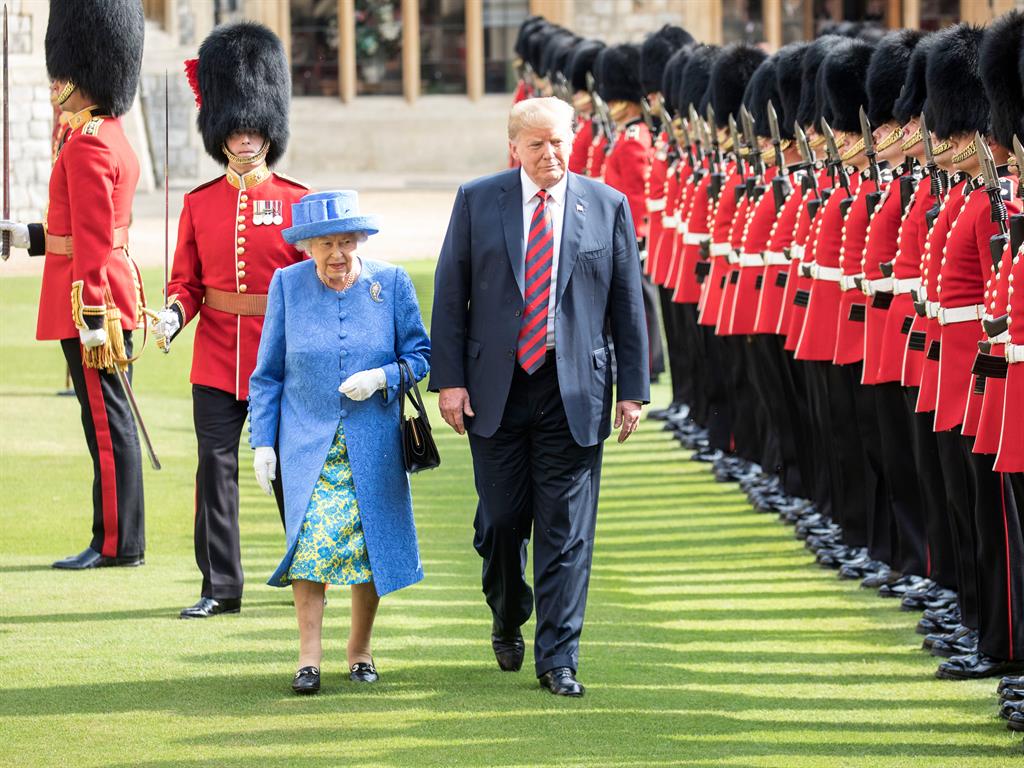 Out of step: Trump joins the Queen to inspect the Coldstream Guards PICTURES: REX/EPA