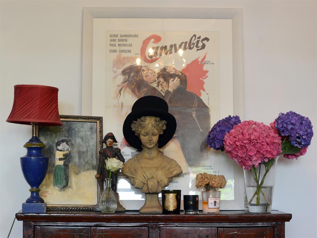 Bargain buys: The statue and knick-knacks come from flea markets