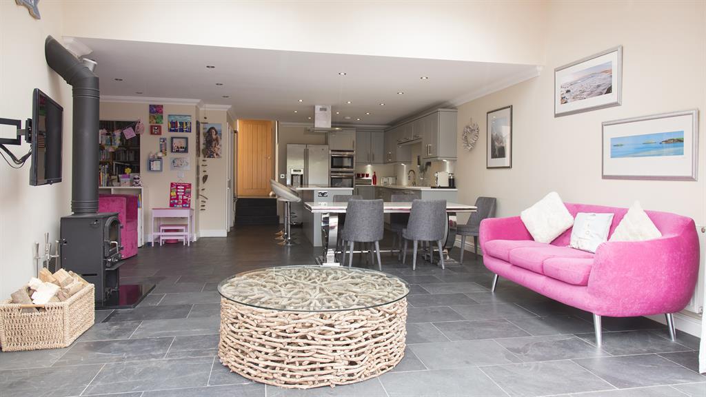 Warm front: The kitchen/diner is Clare’s favourite room, with the wood burner producing a ‘lovely glow’ in the winter