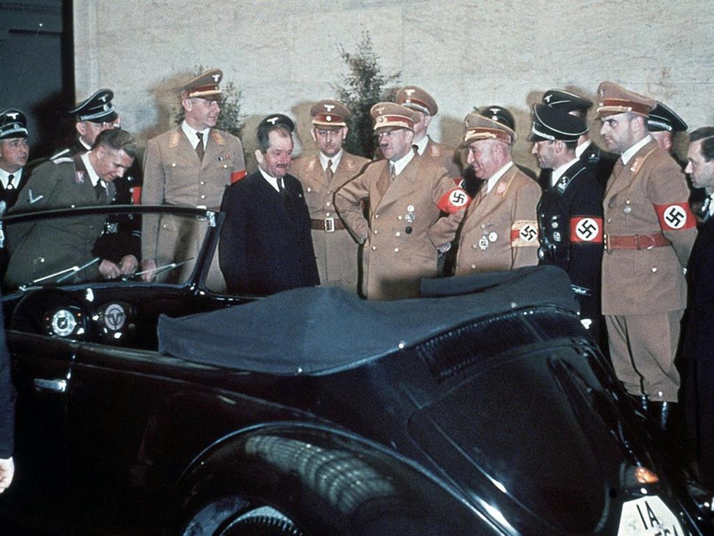Origins: Adolf Hitler and other Nazi officials with a VW in 1939 PICTURES: REX/AP/GETTY