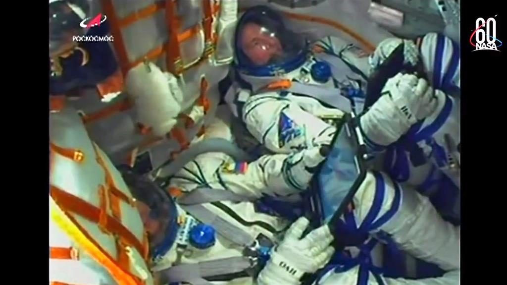 Aborted mission A grab from the Russian space agency's on-board video camera shows Russian cosmonaut Alexey Ovchinin and US astronaut Nick Hague during the launch