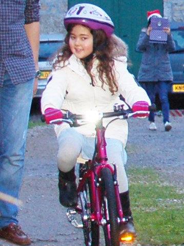 Happy little girl: Ellie Williams on her favourite pink bike PICTURES: SWNS