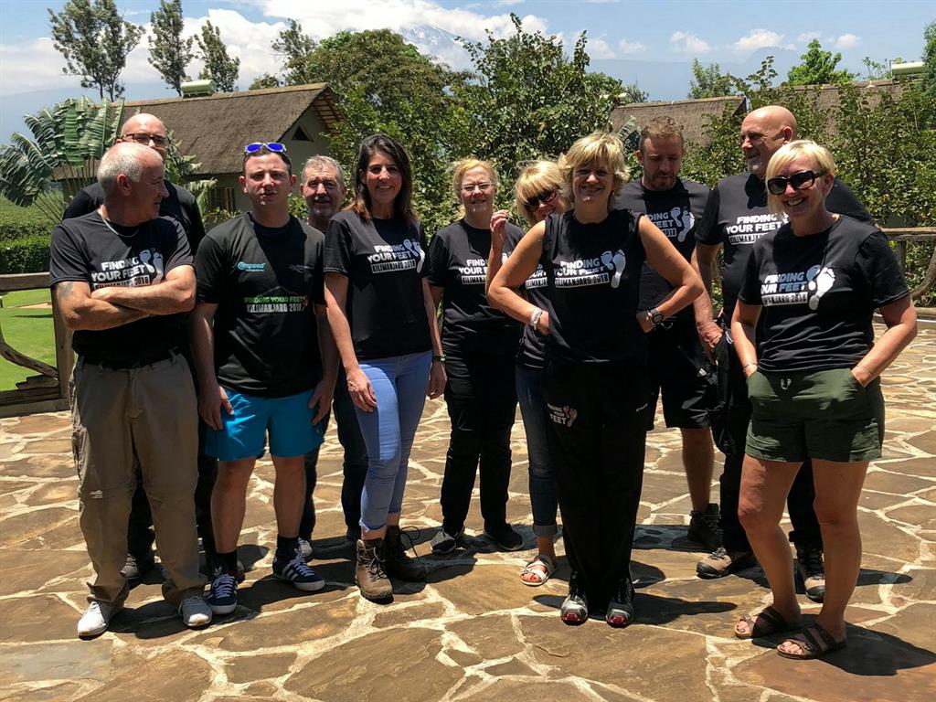 Fundraising team: Corinne (fourth from right) with her fellow climbers before the ascent