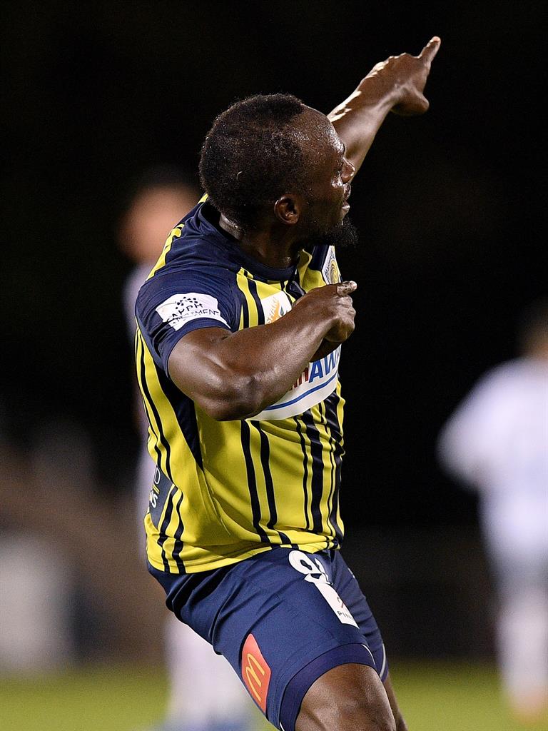 Strike a pose: Bolt with his signature celebration