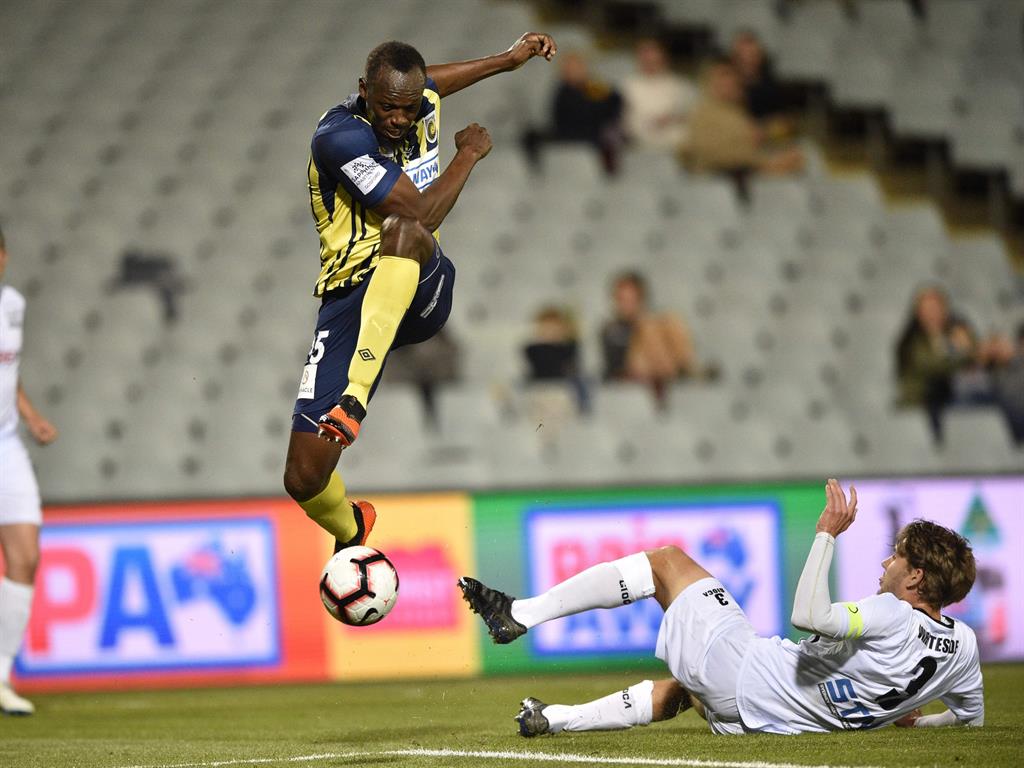 Desire: Bolt was more hungry after the break PICTURES: GETTY/EPA