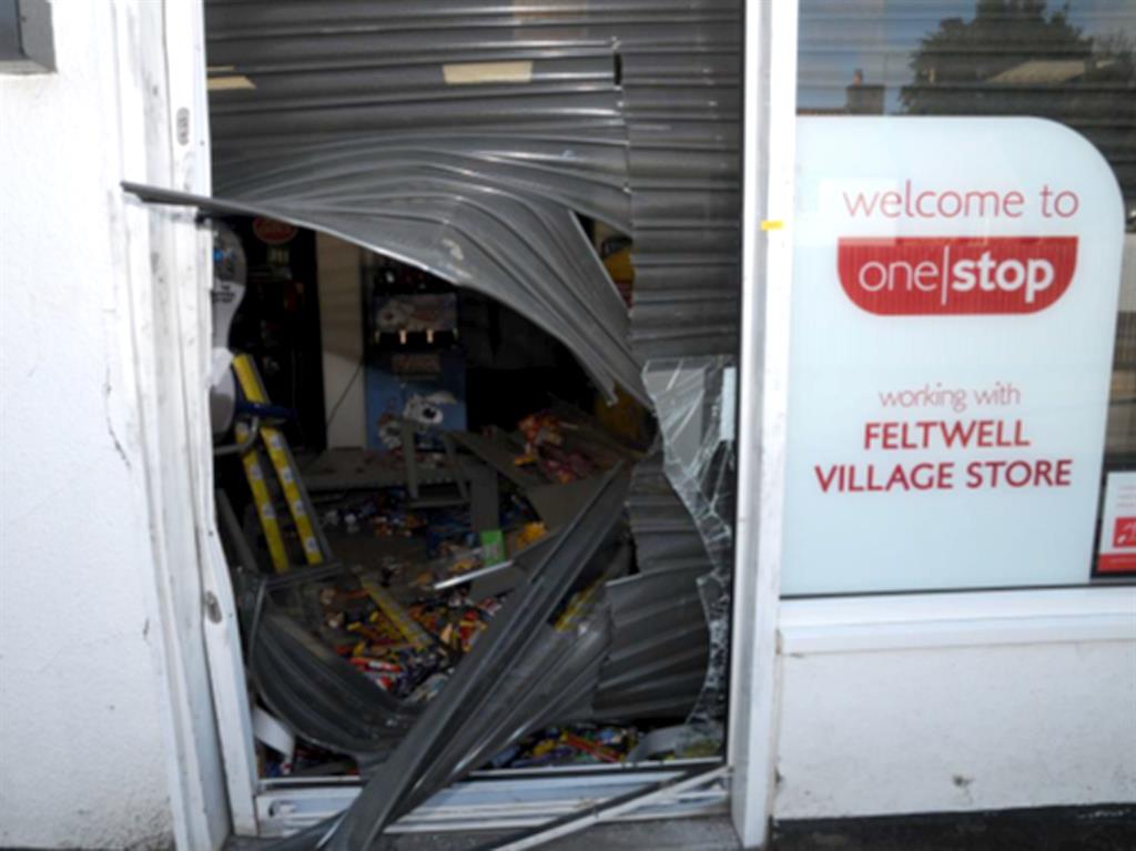 Last job: A One Stop convenience store in Feltwell, Norfolk, where the pair broke in using two stolen vehicles and a disc cutter PICTURES: BEDFORDSHIRE POLICE/PA