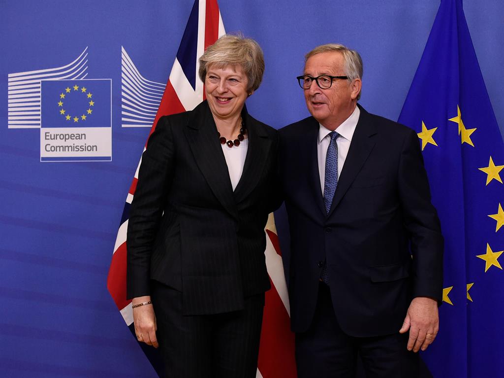 Just me and EU: Mrs May with Jean-Claude Juncker this week PICTURE: AFP