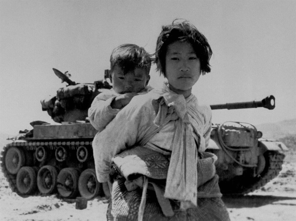 Safe harbour: Kim’s novel is set around Korean War refugees being resettled in the port of Busan (below)