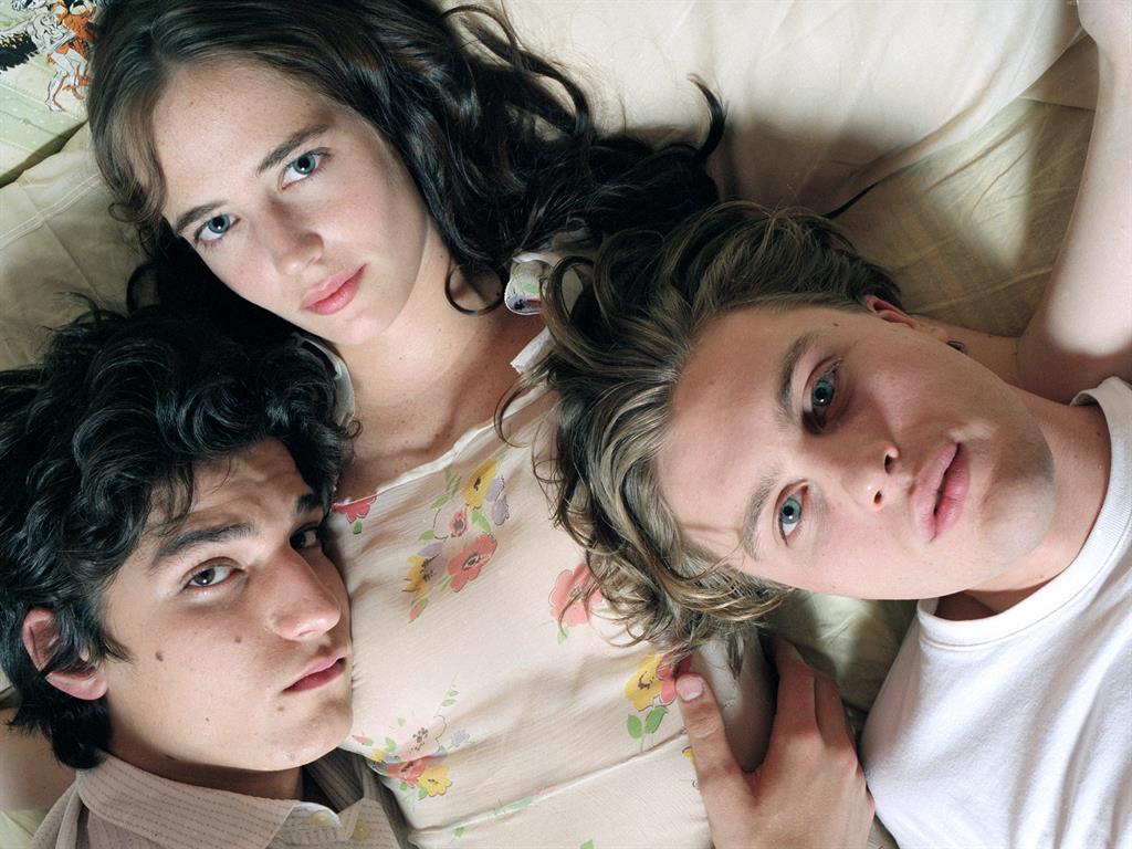 Wake-up call: Louis Garrel, Eva Green and Michael Pitt in The Dreamers, which was set amid the student riots that shook Paris in 1968