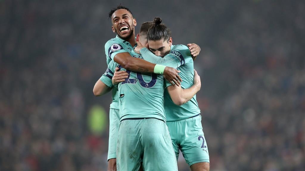 Split decision Arsenal celebrate Mustafi’s opening goal before Lingard nicks a point for United seconds after the Gunners had retaken the lead