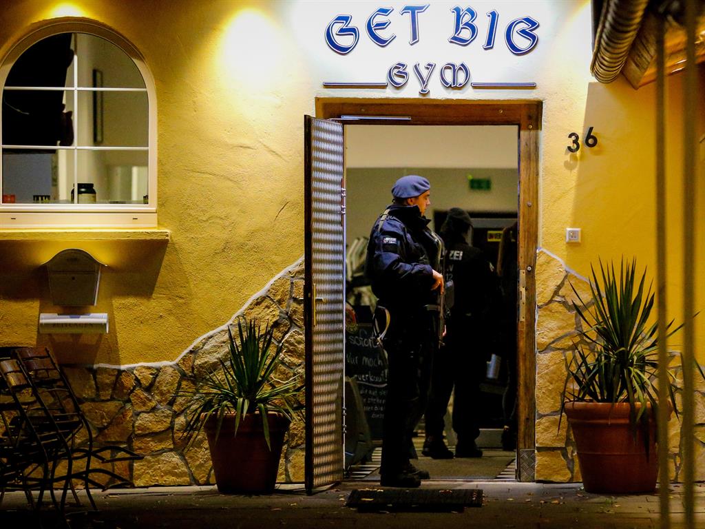 Co-ordinated: A restaurant raided in Germany PICTURES: EPA/REX