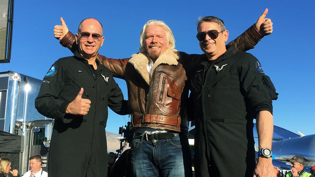 Thumbs up up and away Richard Branson with pilots Rick CJ Sturckow and Mark Stucky