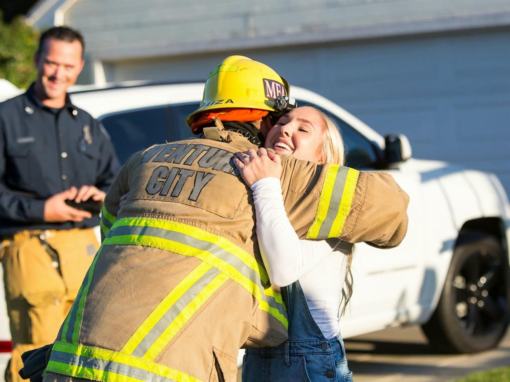 She said yes: The couple embrace after Zach's proposal is accepted