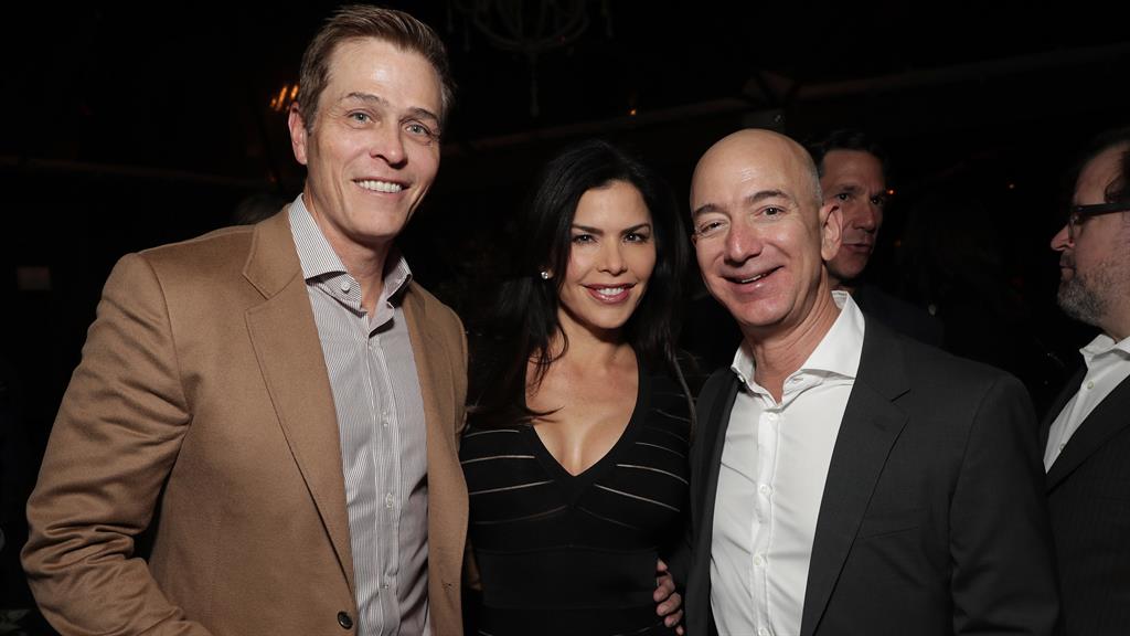 ‘Smitten’: Jeff Bezos with Lauren Sanchez and her husband Patrick Whitesell at an LA film event in 2016 PICTURES: FILMMAGIC/GETTY