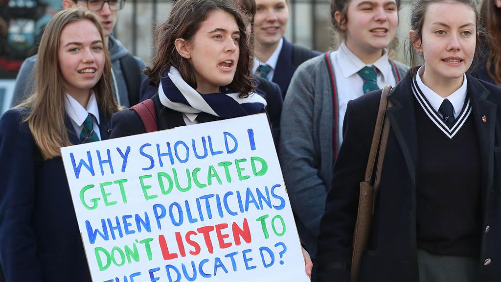 Nationwide anger: Pupils from Methodist College Belfast outside Belfast City Hall