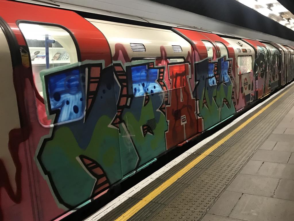 Tribute: Friends of the three graffiti artists who were killed painted a piece on a train last year in their memory PICTURE: SWNS