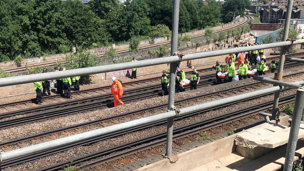 Tragic: Emergency services at the scene last June PICTURE: SWNS