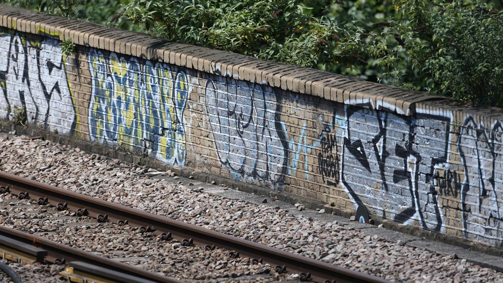 Street art: The young men who died were out tagging on the train tracks PICTURE: SWNS