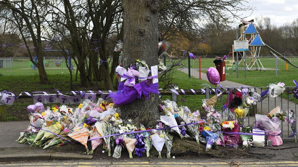 Poignant: A floral tribute in memory of Jodie Chesney, close to where she was stabbed to death PICTURE: REX