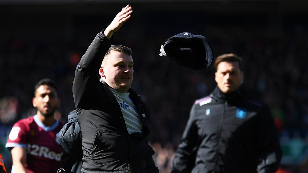 Lead away: Attacker Paul Mitchell is escorted off the pitch